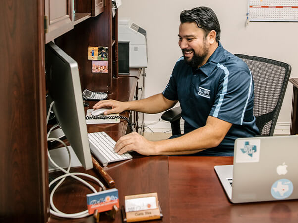 Del's Heating & Air Conditioning team member ready to help