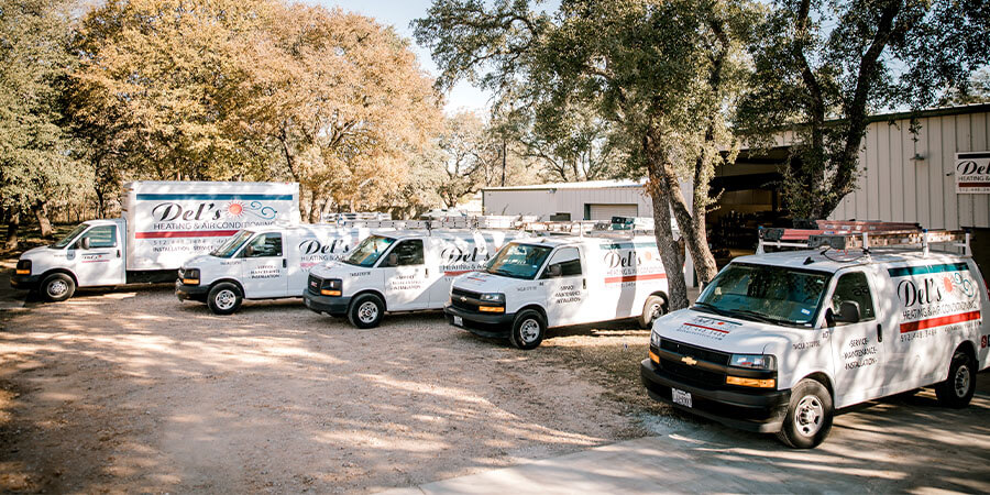 Del's Heating and Air Conditioning vans