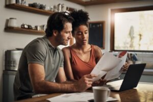 Couple Looking At furnace Bills Together